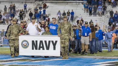 Navy veterans cross the MTSU field