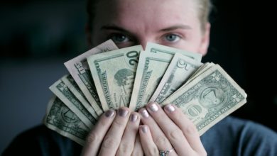 Man Holding Money