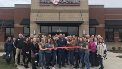 Ribbon Cutting for Two J's Grille