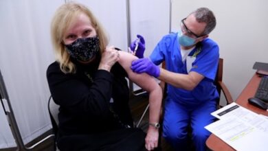 Health System Director Jennifer Vedral-Baron gets Moderna vaccine