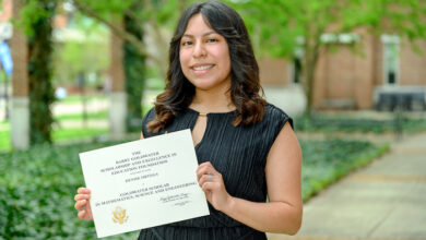 Ortega holds Goldwater certificate