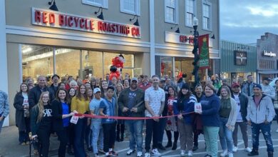 Ribbon Cutting for Red Bicycle - Public Square
