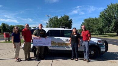 SRO Chad Dodson with State Farm Donation