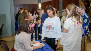 Rachel Martin, left, Middle Tennessee State University alumna and author, meets attendees at MTSU’s College of Education during the presentation for her latest release, “A Most Tolerant Little Town,” as part of the university’s larger MT Engage Week of events in 2023. (MTSU file photo by James Cessna)
