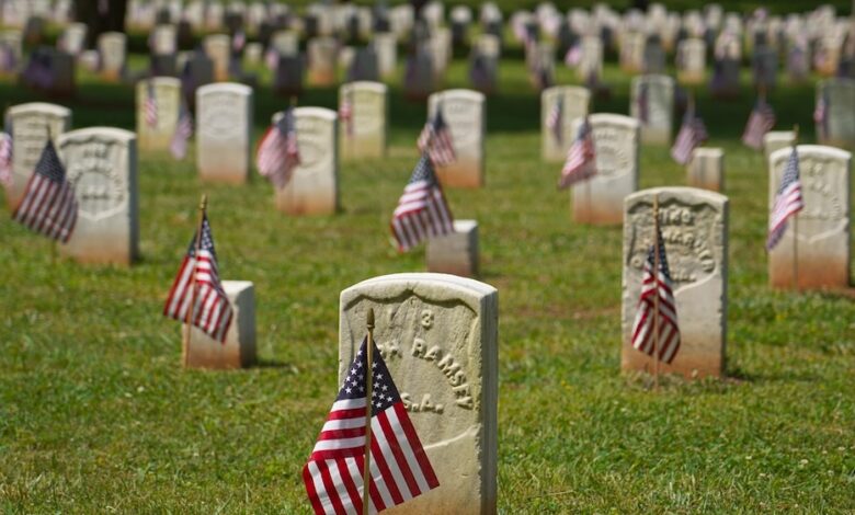 American flags decorate headstones in Stones River National Cemetery