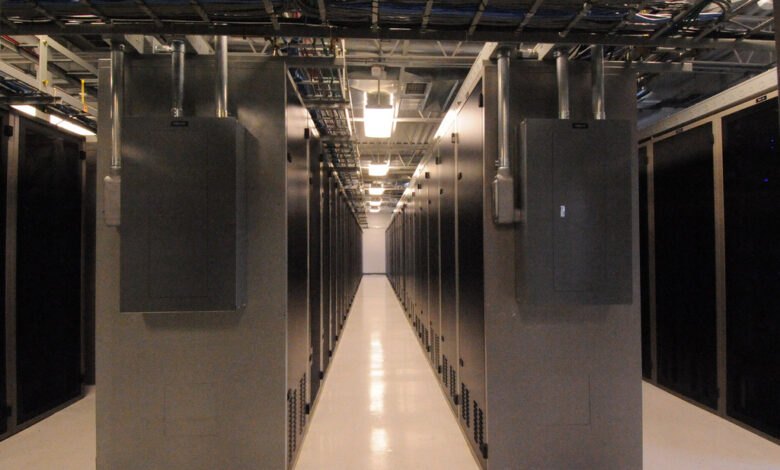 Rows of server racks in a modern edge data center