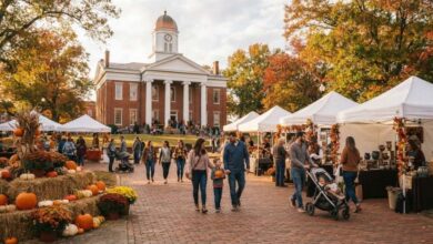 Families at a fall festival on a historic courthouse square with pumpkins and mums (illustrative)