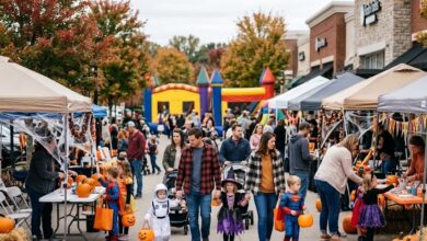 Families in Halloween costumes at an outdoor vendor plaza (illustrative, AI-generated)